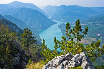 Viewpoint Banjska rock at Tara mountain looking down to Canyon of Drina river, west Serbia - obrazy, fototapety, plakaty