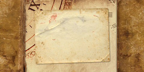 Old vintage album with paper postcards