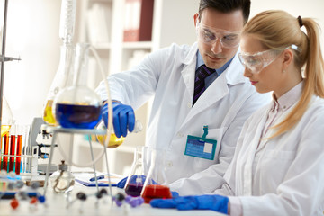 Team of scientists in laboratory.