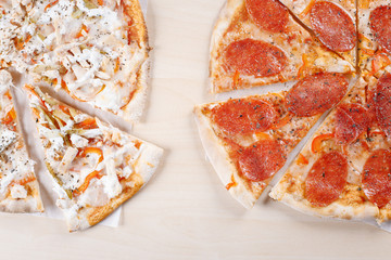 cooked pizza on thin crust in the kitchen