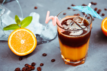 Fresh ice coffee with orange, with mint and ice. Alcoholic, non-alcoholic drink-beverage