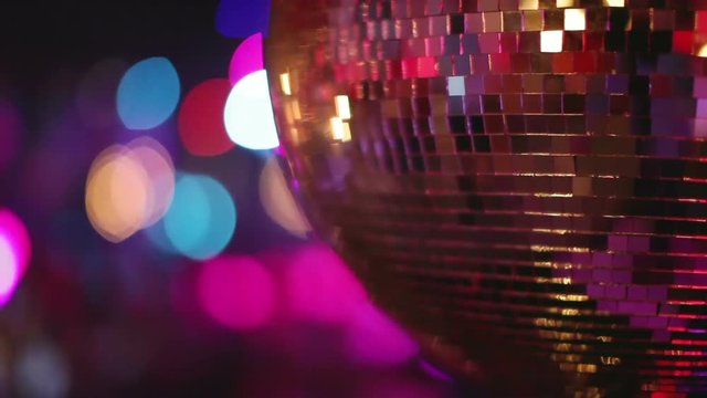glitterball turning on the nightclub dancefloor