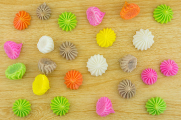Aalaw candy, colorful Thai dessert on wood background