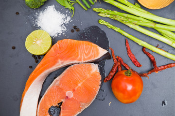 Flatlay of Healthy seafood concept salmon fillet with fresh ingr