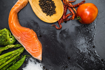 Flatlay of Healthy seafood concept salmon fillet with fresh ingr