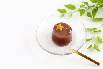 Japanese traditional summer sweet azuki-bean jelly Mizu-yokan covered with beautiful star shaped citron flavored jelly