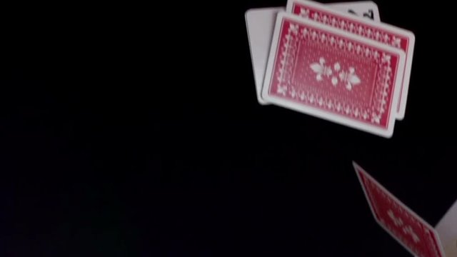 cards being thrown in the air