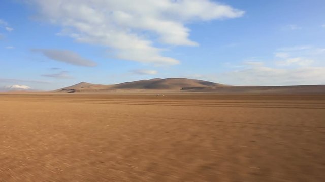 Panoramic view of bolivian altiplano from moving car, Bolivia