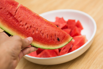 Fresh sliced watermelon in white dish