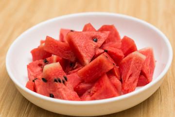 Fresh sliced watermelon in white dish