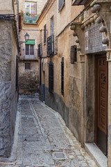 Fototapeta premium Typical alley in the old town of Toledo. Spain.