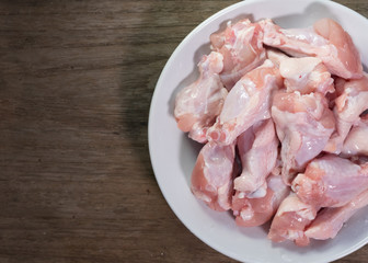 Raw chicken wings in a bow prepare for cooking.