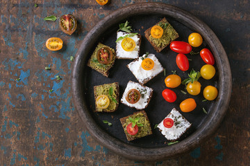 Small sandwiches with tomatoes