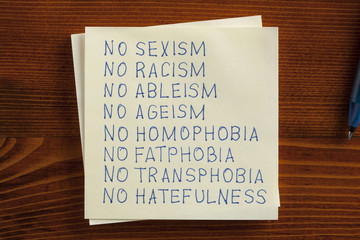 No sexism no racism handwritten on a note