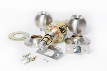 Close up of Stainless steel round ball door knob components isolated white background as Locksmith concept.