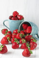Strawberries in mugs