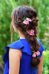 Fototapeta premium Beautiful brunette hairstyle back view