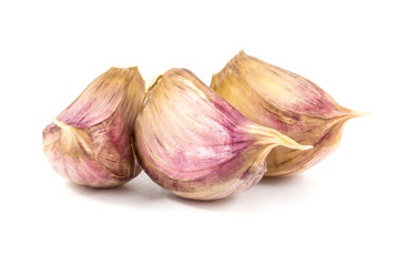 Garlic cloves isolated on white background