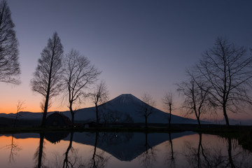Mount Fuji during sunrise with small lake at Fumoto