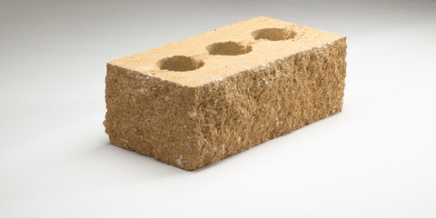 Brick concrete face crushed sided hollow thickened in different colors. on a white background