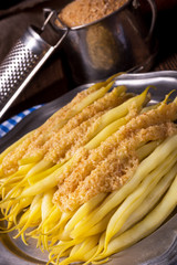 yellow string bean with bread crumbs