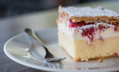 Sweet berry cake on a plate macro selective focus.