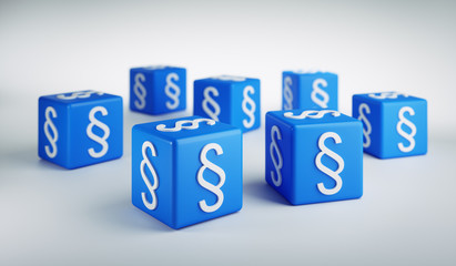 Paragraphen auf blauen Würfeln © peterschreiber.media