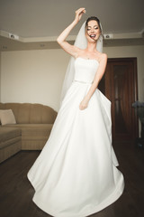 Naklejka premium Luxury bride on the morning of wedding day