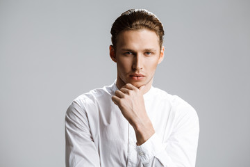 Obraz premium Picture of attractive caucasian man over white background