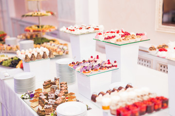 Delicious wedding reception candy bar dessert table