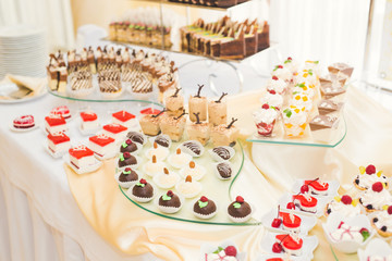 Fototapeta na wymiar Buffet with a variety of delicious sweets, food ideas, celebration