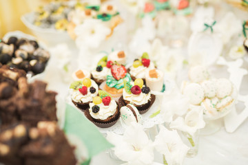 Different kinds of baked sweets on a buffet