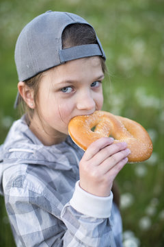 Girl Eating Pretzel