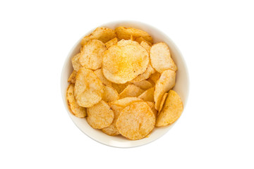 White round bowl full of potato chips viewed from above, isolated on white background.