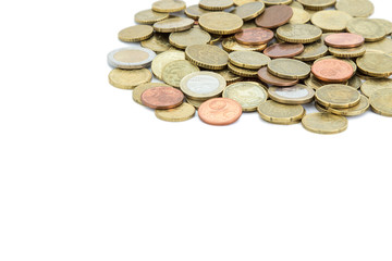 Heap of different Euro coins isolated on white background. Copy space.