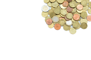 Heap of different Euro coins isolated on white background, viewed from above. Copy space.