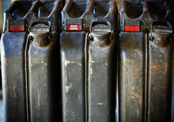 Old-fashioned military style jerrycan background
