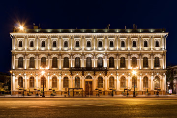 Fototapeta na wymiar St. Petersburg, Russia - May 31, 2016: Night illuminated facade of building of N.I.Vavilov Institute of Plant Genetic Resourses front view.