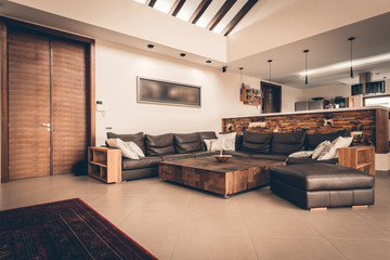 Big leather sofa in apartment interior
