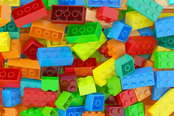 Naklejka premium Plastic building blocks background, 3D rendering