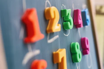 Learning numbers on a blackboard © berezko