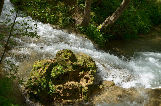 Closeup of rapids of mountain stream over rocks