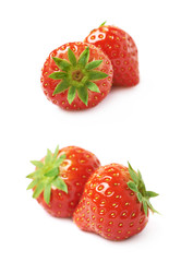 Pair of red strawberries isolated