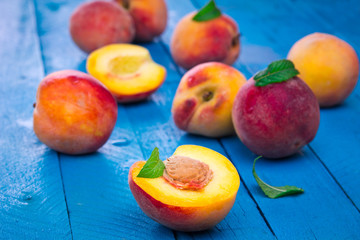 Ripe peaches with mint