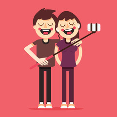 young couple standing full length trying to make a self portrait