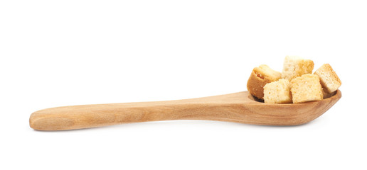 Spoon full of croutons isolated