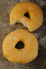 Donuts on wooden background