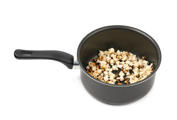 Pot filled with the popcorn isolated