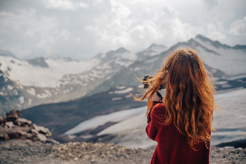 woman on top of mountain