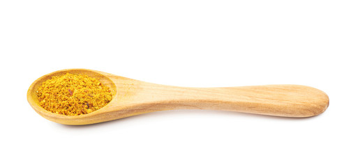 Spoon full of yellow curry powder